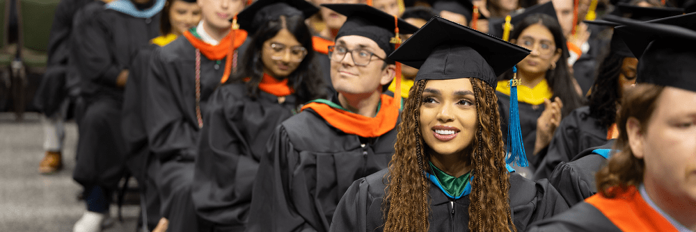 UNC Charlotte master's and doctoral students at commencement ceremony